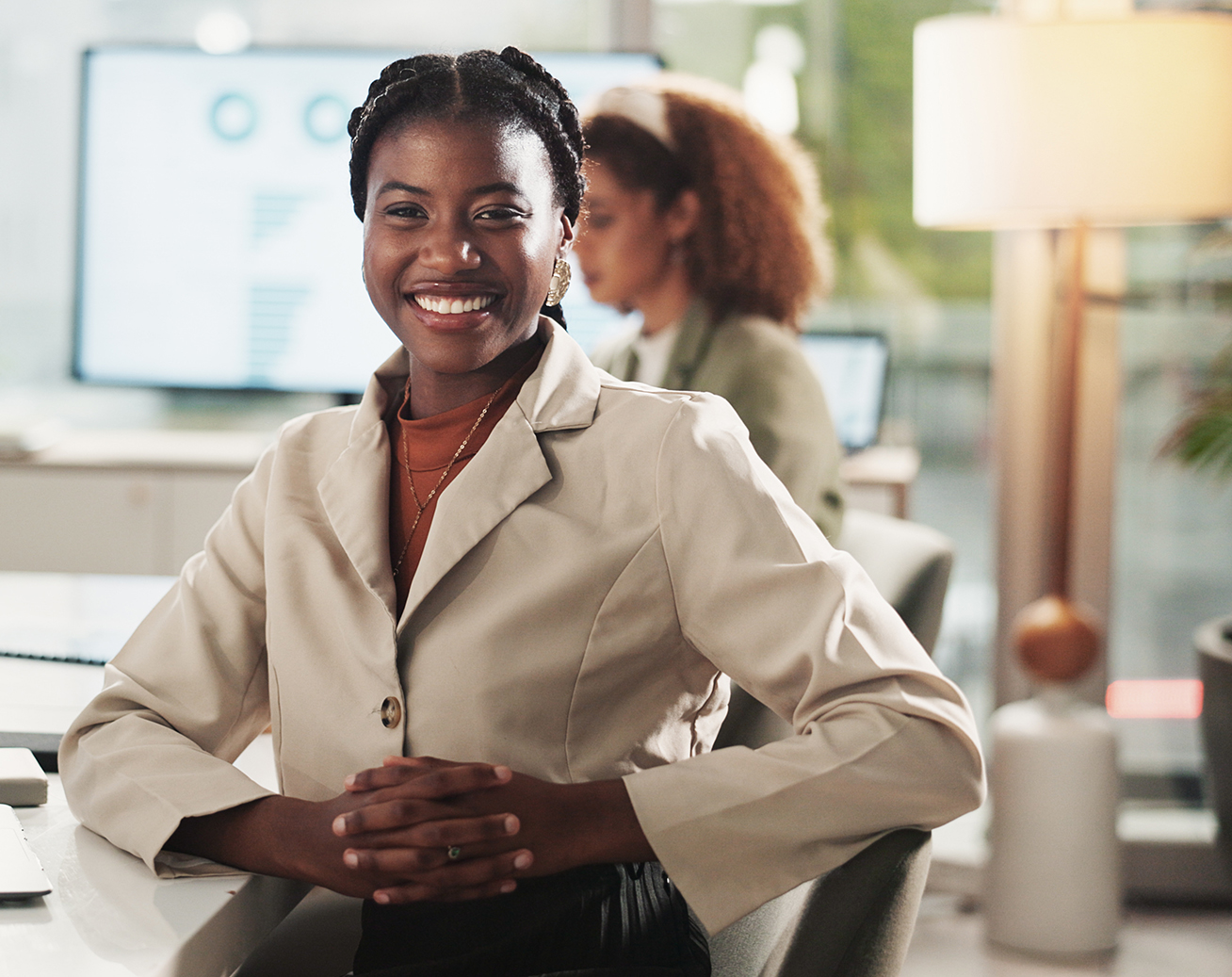 Smiling professional in an office meeting